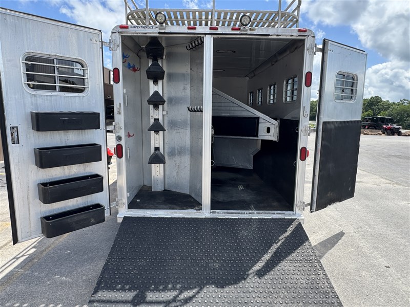 1999 Featherlite 8413 four horse trailer with mid-tack & generator