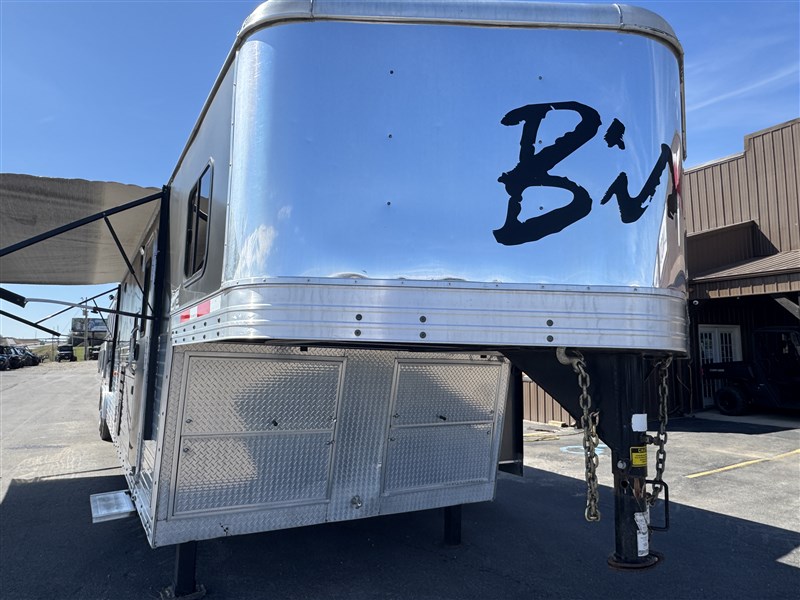 2014 Bison 8418 with couch, dinette, & a 12' super slide