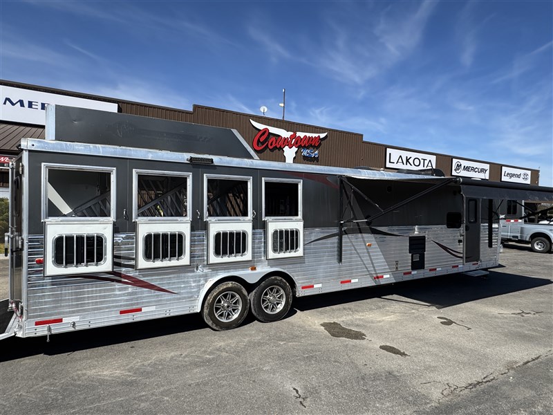 2014 Bison 8418 with couch, dinette, & a 12' super slide
