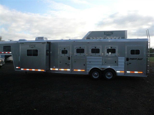 2012 Logan Coach Loaded 4 horse 11'LQ with Slide!